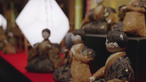 japanese dolls, rack focus shot over hina matsuri display