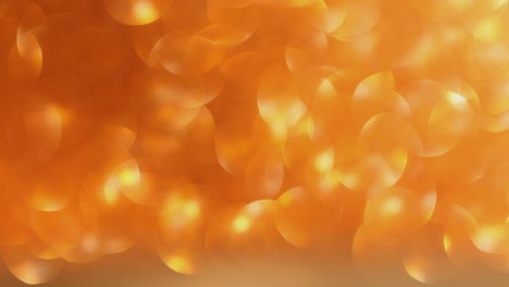 golden defocused blur bokeh lights moving holiday celebration xmas background