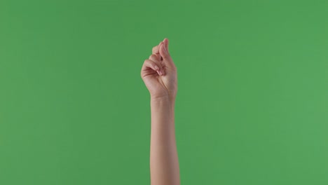 hand with fingers crossed