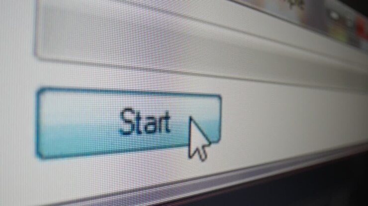 Mouse cursor clicks on the loading bar on a computer screen
