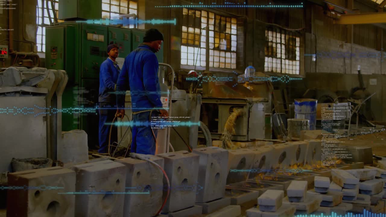 Two technicians welding metal molds in manufacturing workshop, showing digital waveform overlays