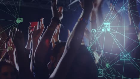 Digital-composite-video-of-digital-social-media-interface-icons-against-people-dancing-in-concert