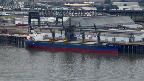 port on mississippi river with cargo ship in baton rouge louisiana