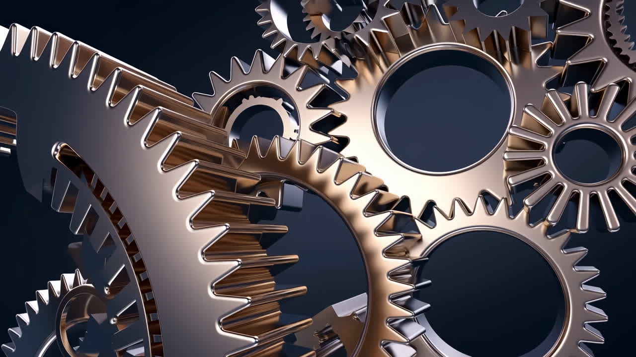 Close-up of Metallic Gears Rotating in a Complex Mechanism