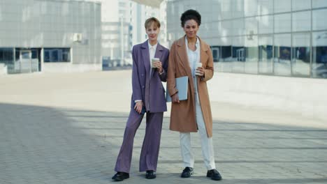 two businesswomen in modern attire