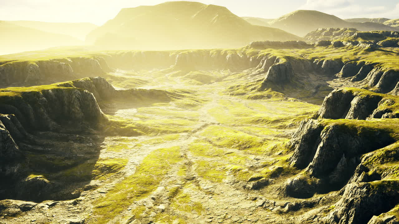 Vast rugged landscape bathed in golden sunlight showcasing natures beauty