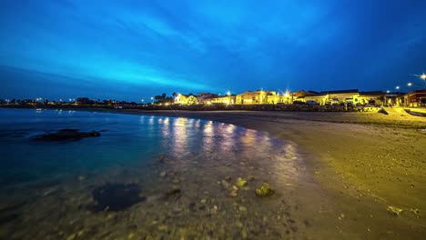 Static-view-of-Spiaggia-Marina-Vecchia-di-Avola,-Eloro-District,-Province-of-Syracuse,-Sicily,-Italy-at-night-time-in-timelapse