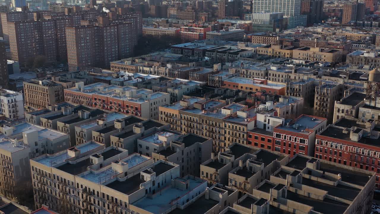 aerial flight over symmetric rooftops in the Harlem neighborhood of New York City