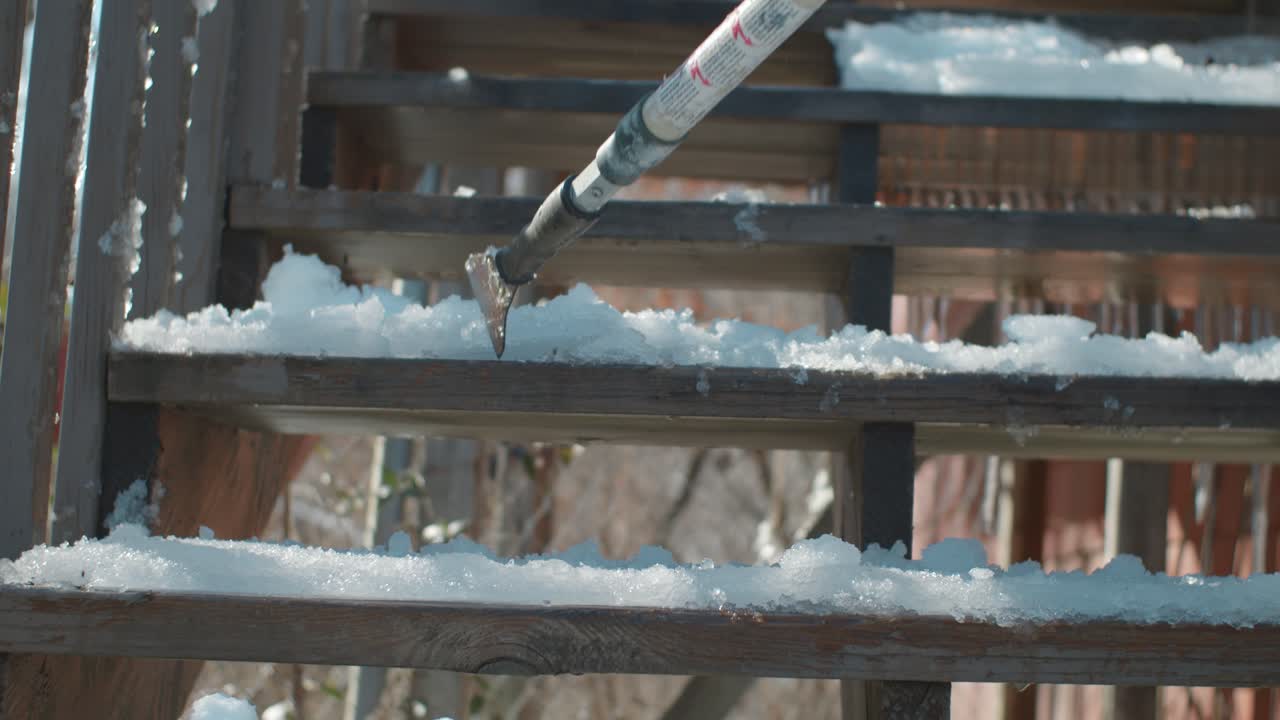 Removing big blocks of ice from staircase