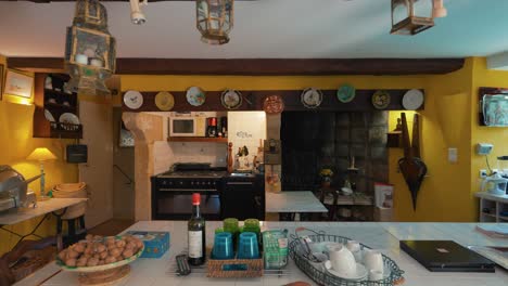 slow dolly shot of an antique kitchen within a chateau de pouzilhac