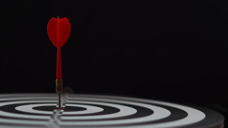 Slow motion arrow is pushing the target to the points of the score board.