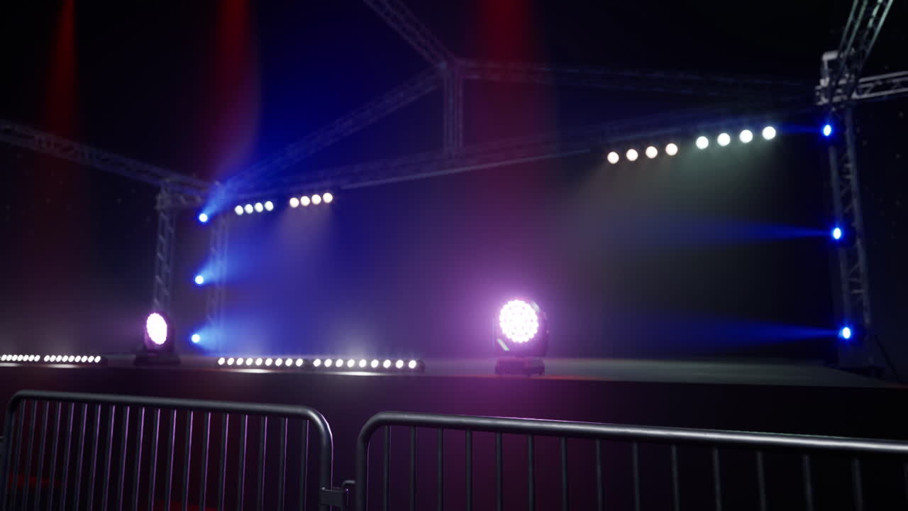 Stage setup with colorful lights prepared for an event in an indoor venue