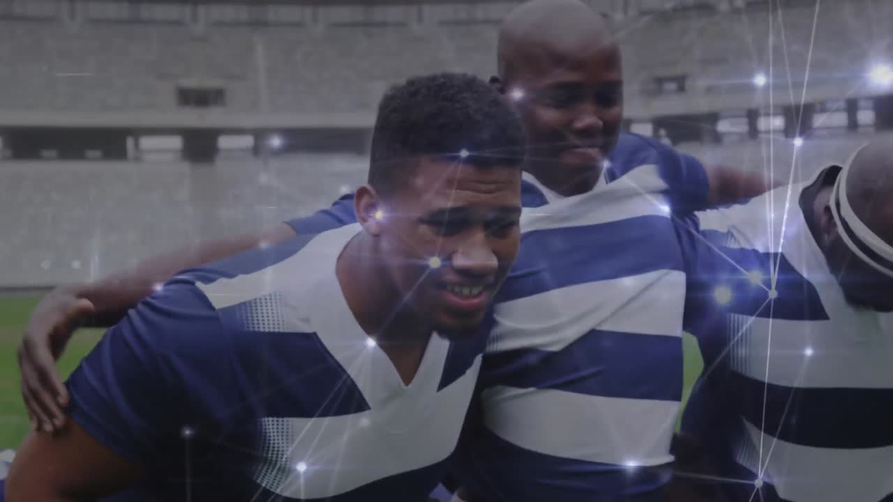 Animation of network of connections over team of diverse male rugby players defending together