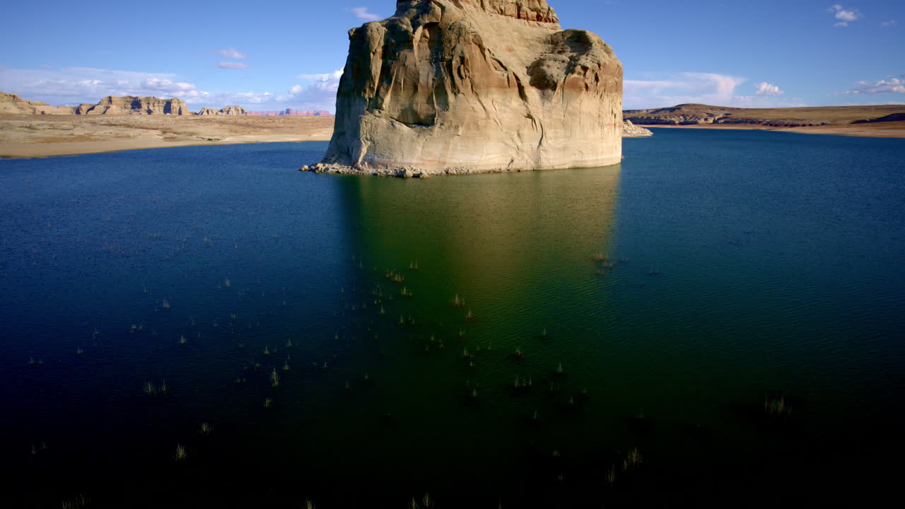 The camera soars above red-rock landscapes with an almost alien feel near Page, Arizona.