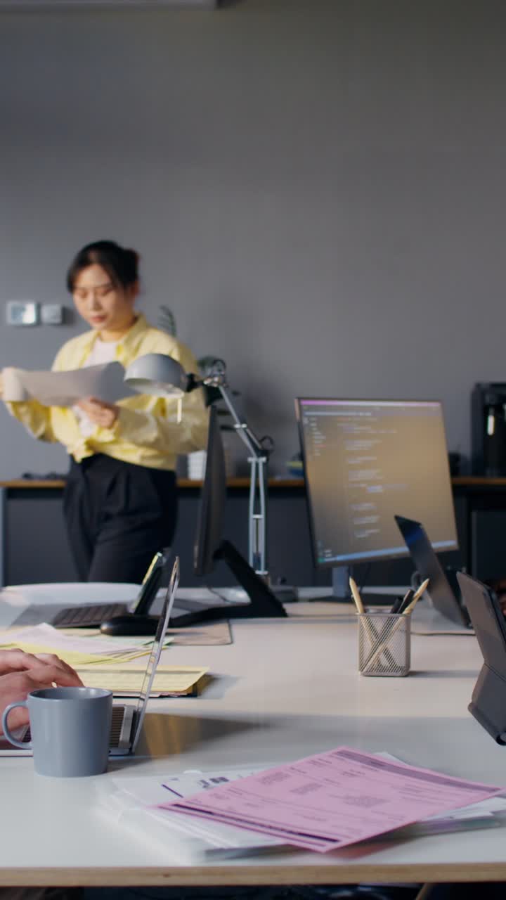 Modern Office Workspace with Colleagues Working