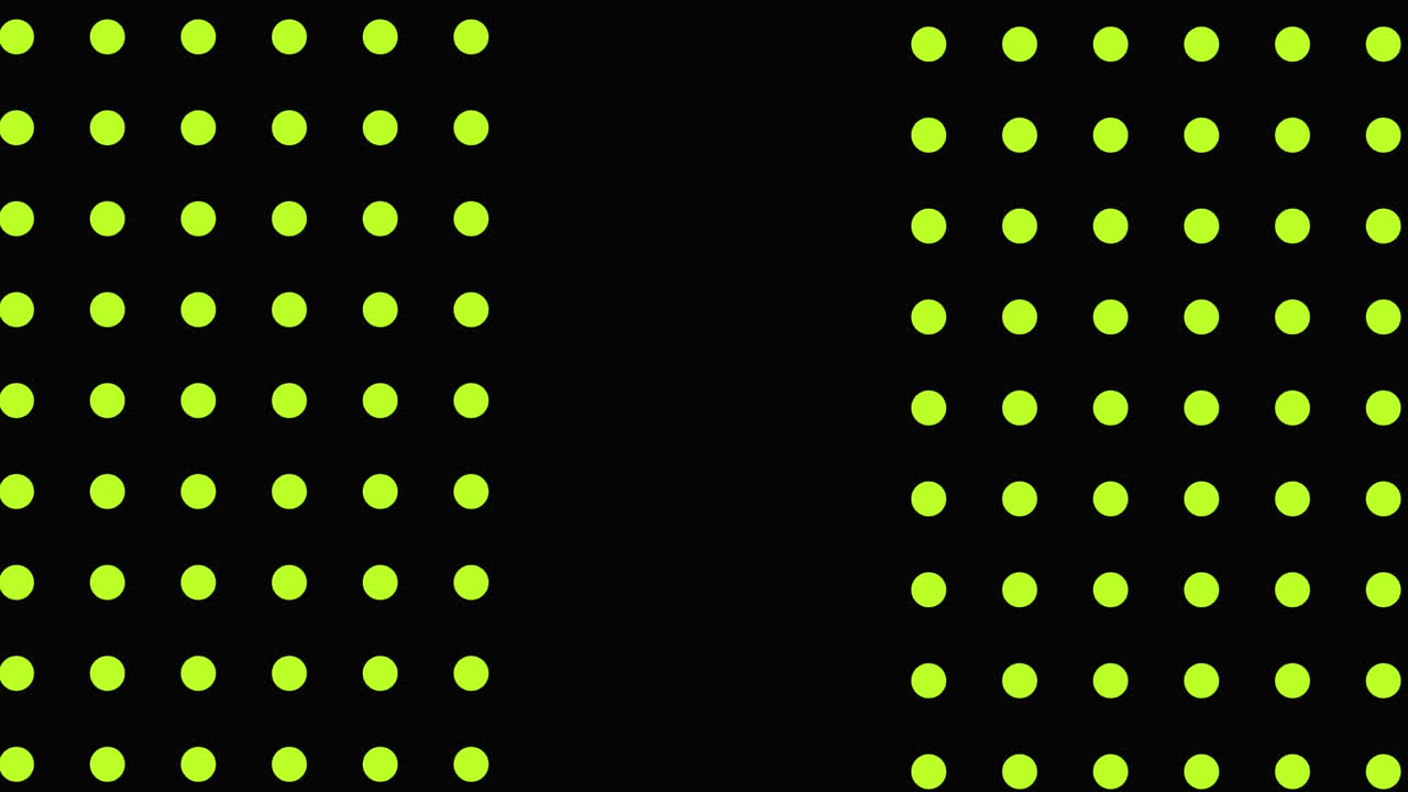 Green and yellow triangles and white flashes moving on a black background with yellow dots