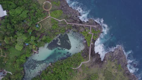 Top-down-of-weekuri-lagoon-with-no-people-at-Sumba-Indonesia,-aerial