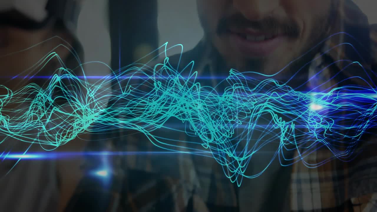 Man holding tablet and woman collaborating with waveform emanating from device for tech project