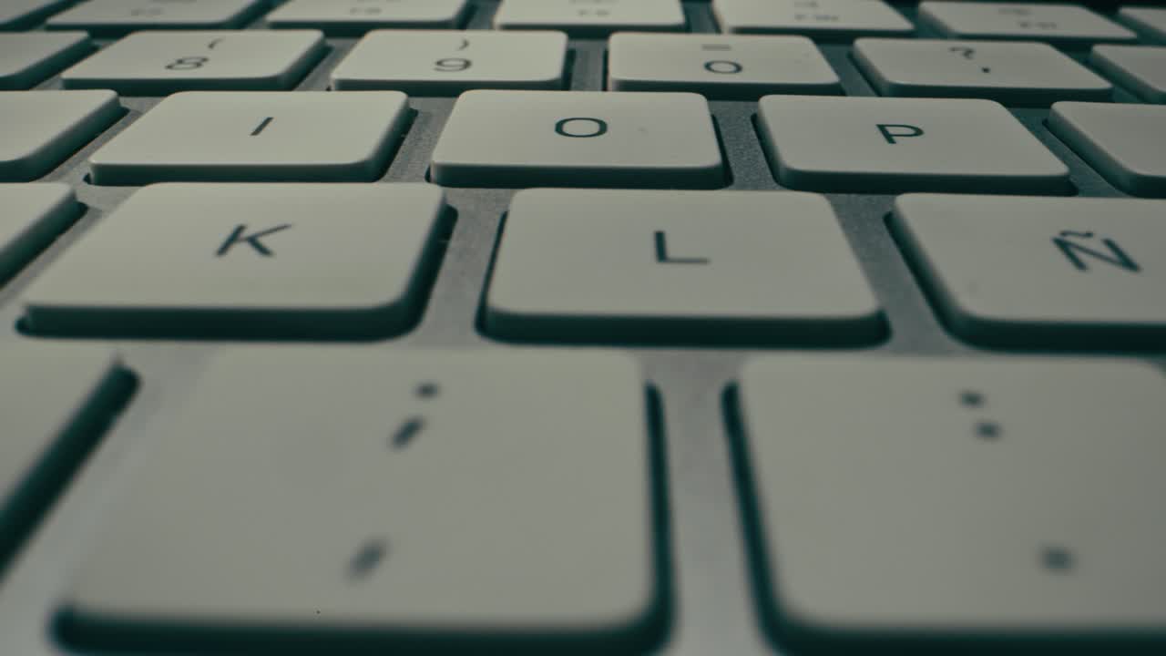 This is a detailed view of a sleek, modern keyboard that showcases its smooth keys and elegant overall design