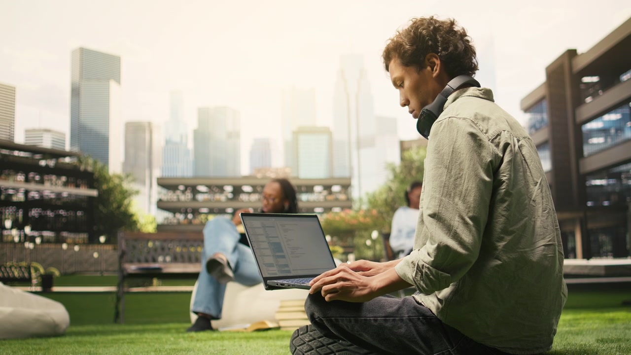 Student working on programming code on laptop during study session