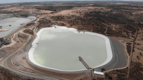 reservoir at the water supply facility in monte perreiro, portugal - aerial