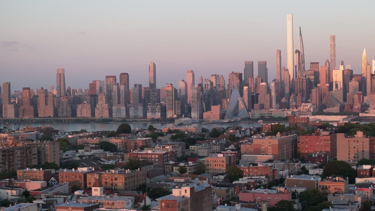 Aerial view of suburban New Jersey at dusk. Shot with the New York City skyline in the background.