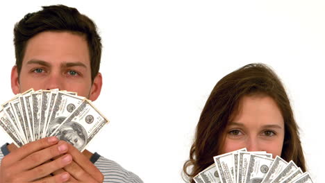 Happy-couple-holding-money