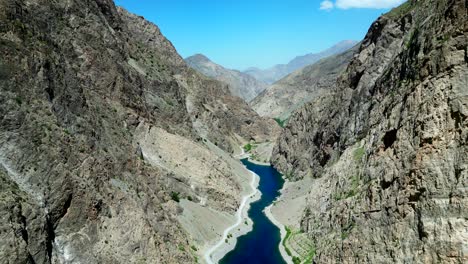 Beautiful-aerial-view-blue-water-lake-or-tarn-in-mountain-range