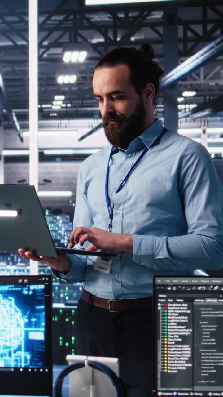 Vertical video Data center technician using laptop to monitor neural network AI LLM