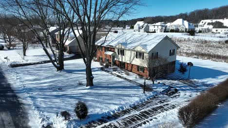 Aerial-approaching-shot-of-beautiful-american-house-in-suburb-area