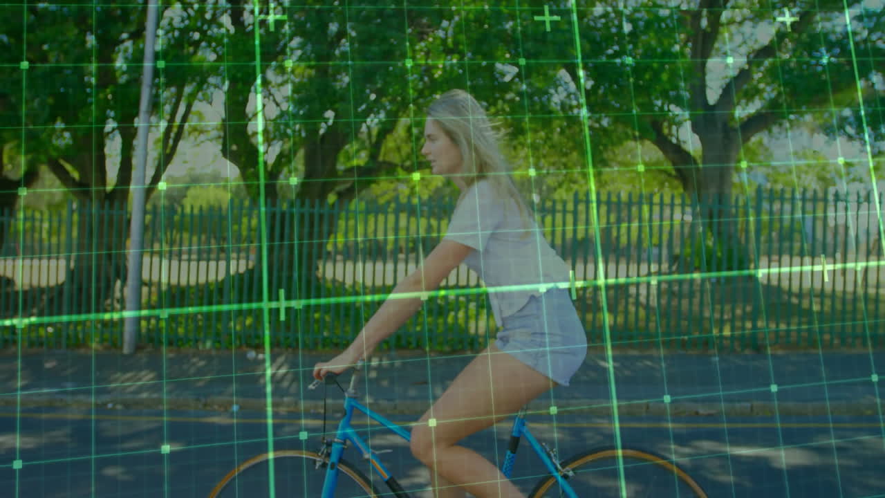 Riding bicycle with digital animation overlay, woman in outdoor setting