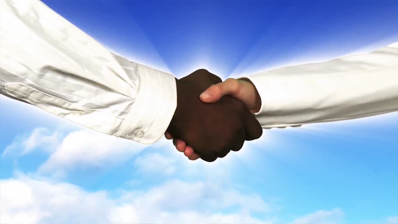 Close up of business people shaking hands