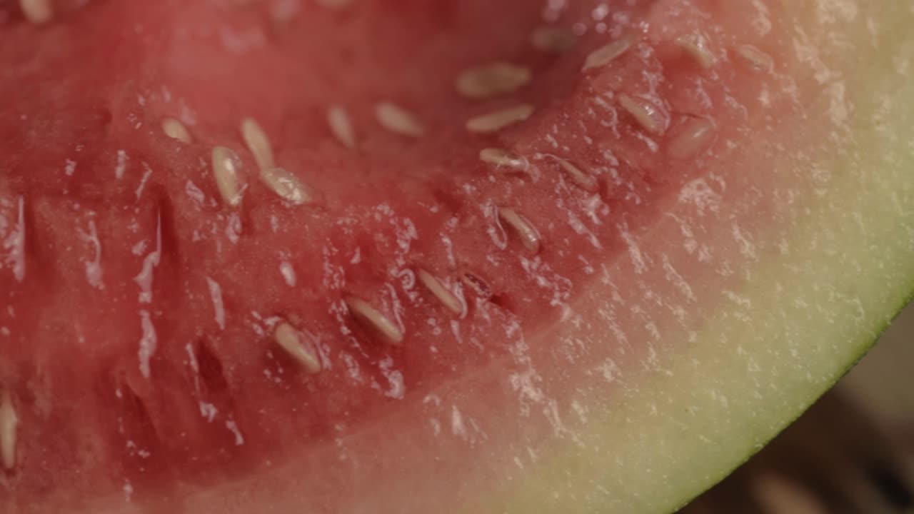 Juicy ripe watermelon panning shot macro
