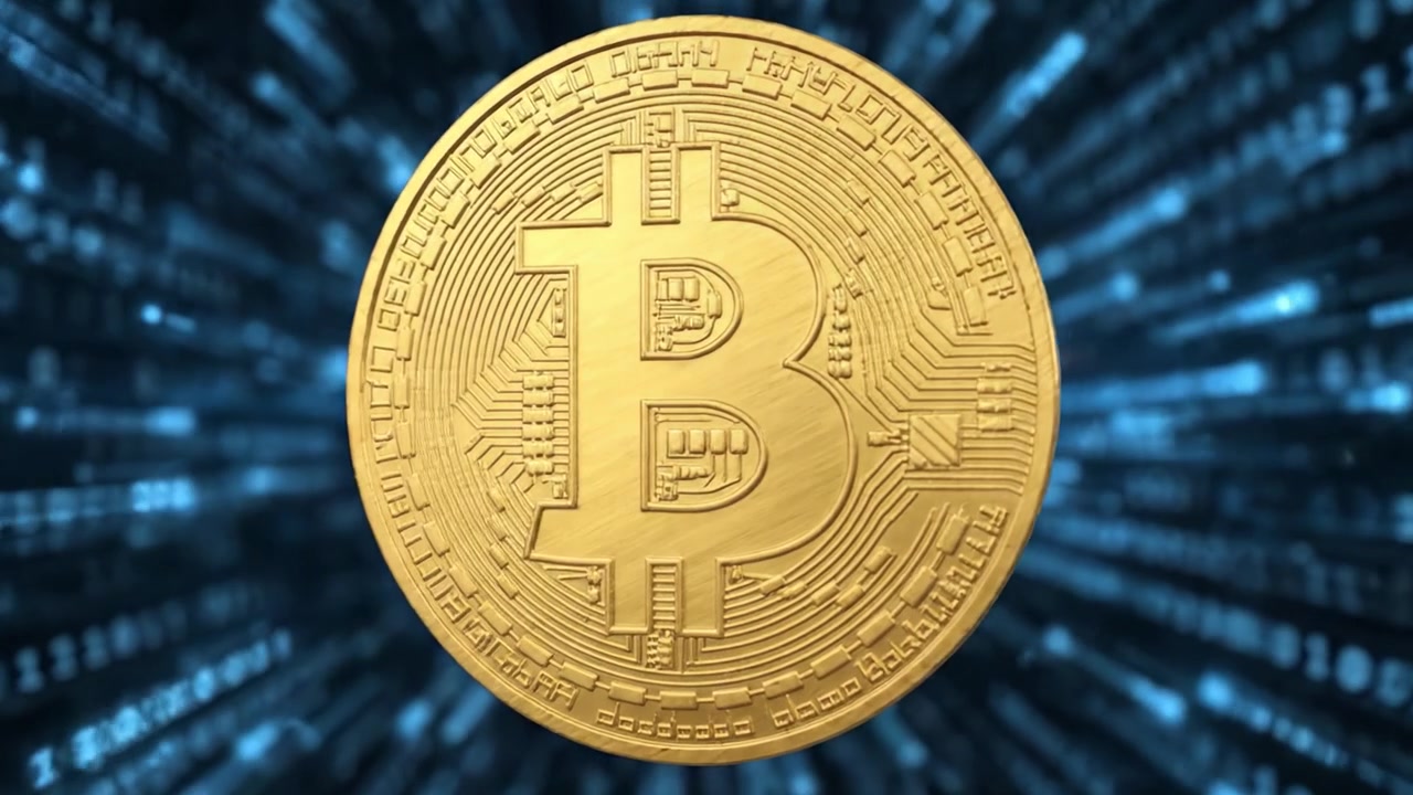 Una straordinaria rappresentazione digitale di Bitcoin, la criptovaluta pionieristica, circondato da una matrice di codice binario che illustra il moderno panorama finanziario.