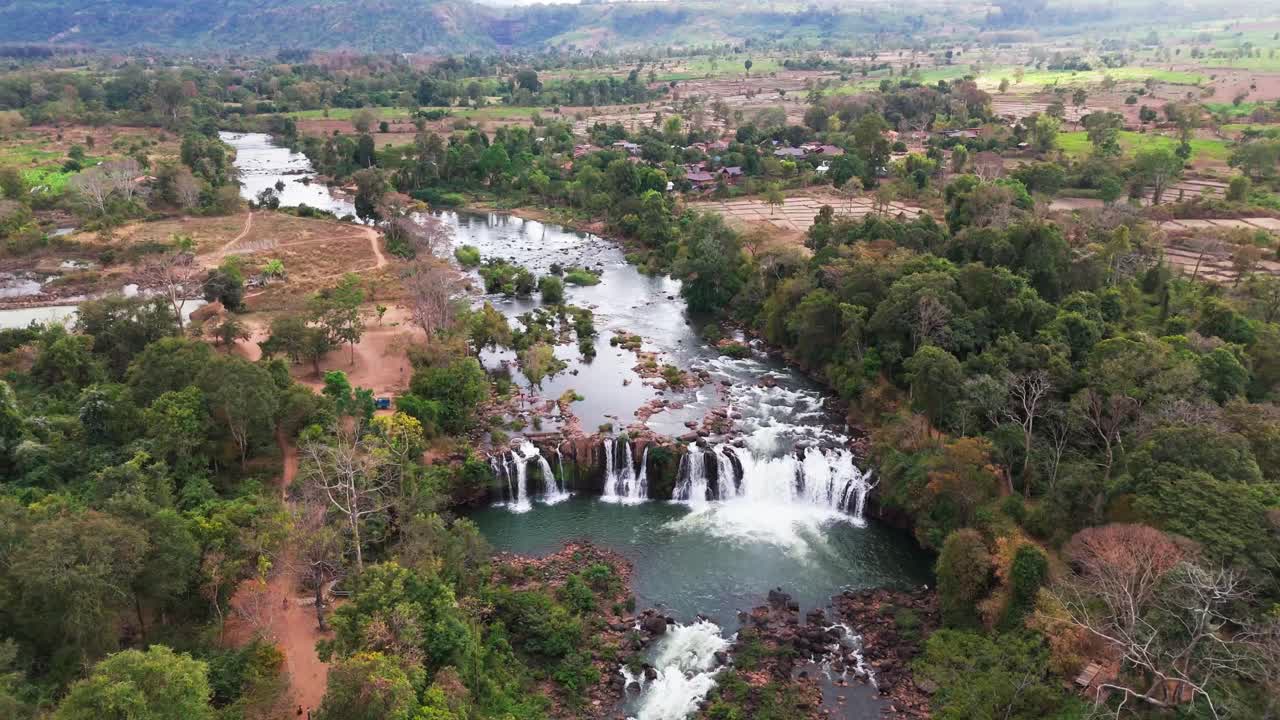 Aerial view at sunset of the Bolaven Plateau waterfall in nature near Pakse Laos travel destination famous for motorcycle loop