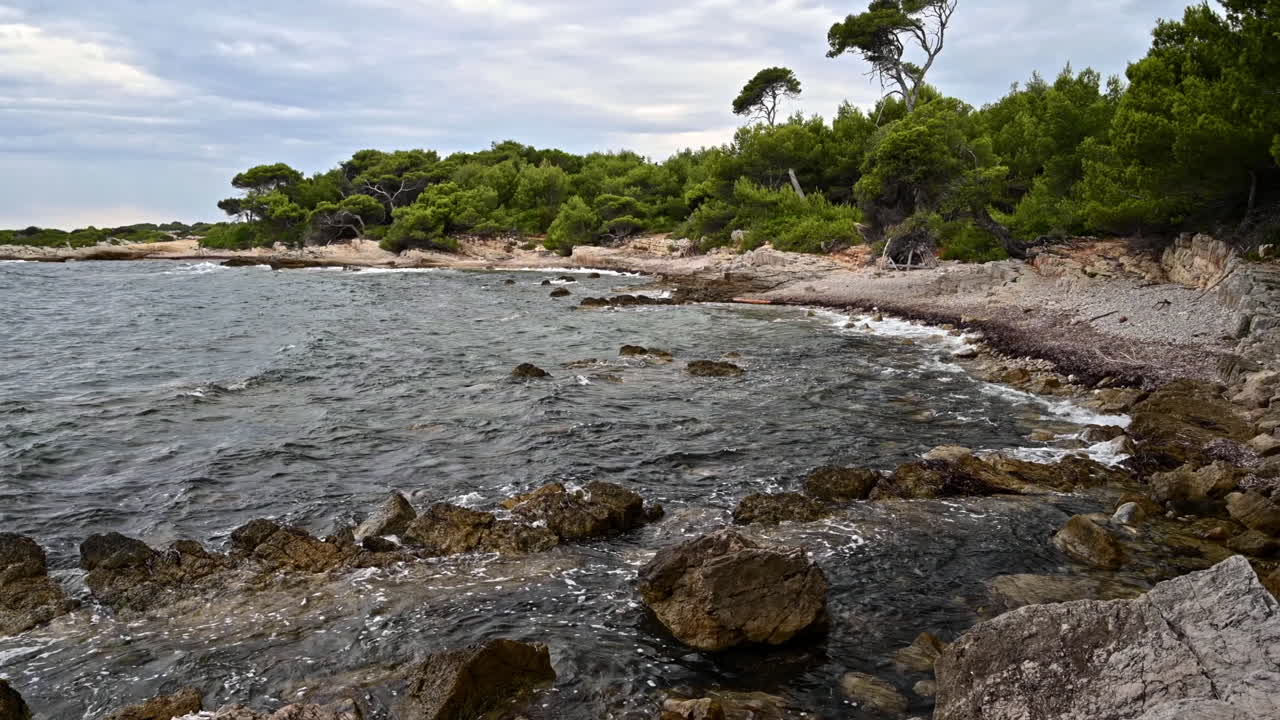 View of the Mediterranean sea coast on the Island of Sainte-Marguerite, a lot of greenery, France