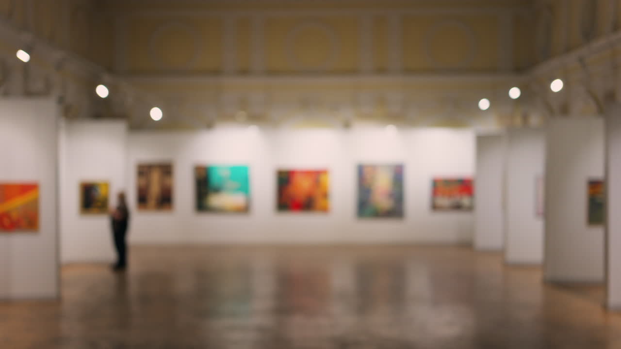 Blurred view of people walking through the National Museum of Fine Arts in Chisinau, Moldova