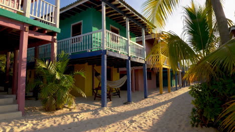 colorful beachfront cottages in a tropical paradise
