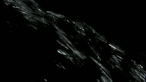 abstract light streaks and reflections on black background
