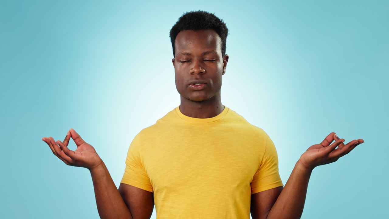 Hands, meditation and black man in studio