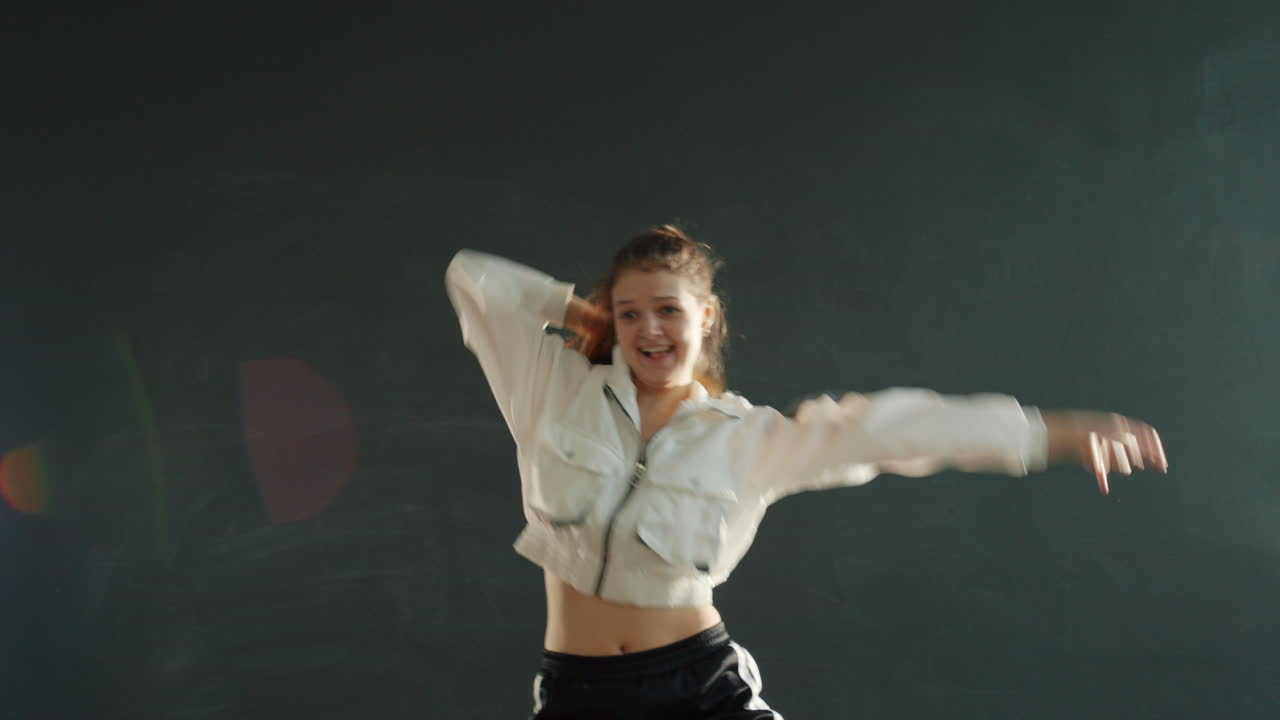 Teenage Girl Dancing in Studio