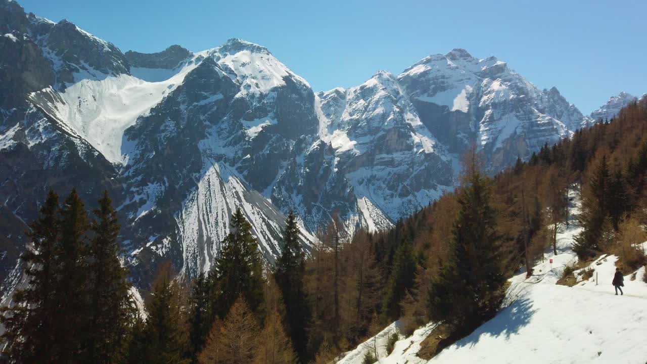 Snow covered mountains in the Pinnis Valley in Austria, camera panning