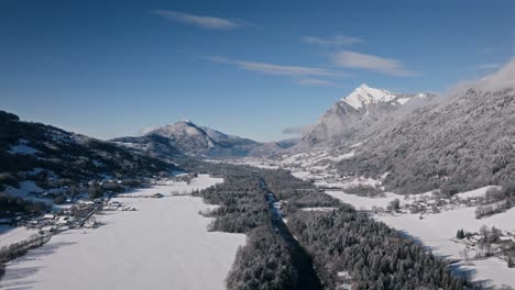 aerial shot of the giffre valley with snow-covered landscapes and mountains