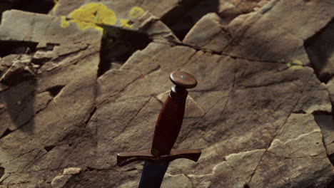 Excalibur-sword-in-rocky-stone-at-sunset