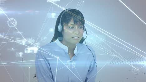 Animation-of-networks-of-connections-over-businesswoman-using-phone-headsets