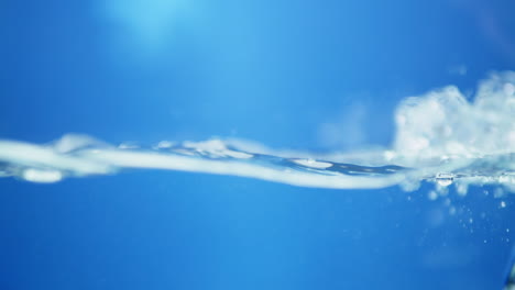 water waves on surface with blue background_slow motion