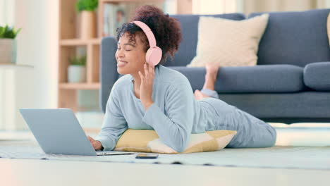 young woman enjoying music online