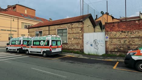 ambulances lined up outside a hospital in naples