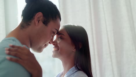 couple, forehead and touch for love in home lens