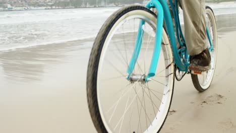 senior man riding bicycle